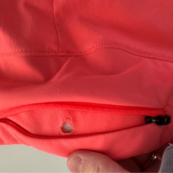 Oiselle Women's Roga Shorts in bright coral - Picture 4 of 5